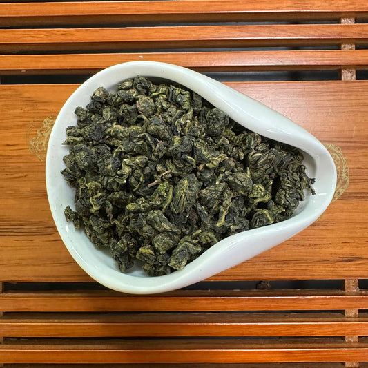 ТАЙВАНСЬКИЙ УЛУН ТУН ДІН (凍頂烏龍 / Dòngdǐng Wūlóng / Dong Ding Oolong)