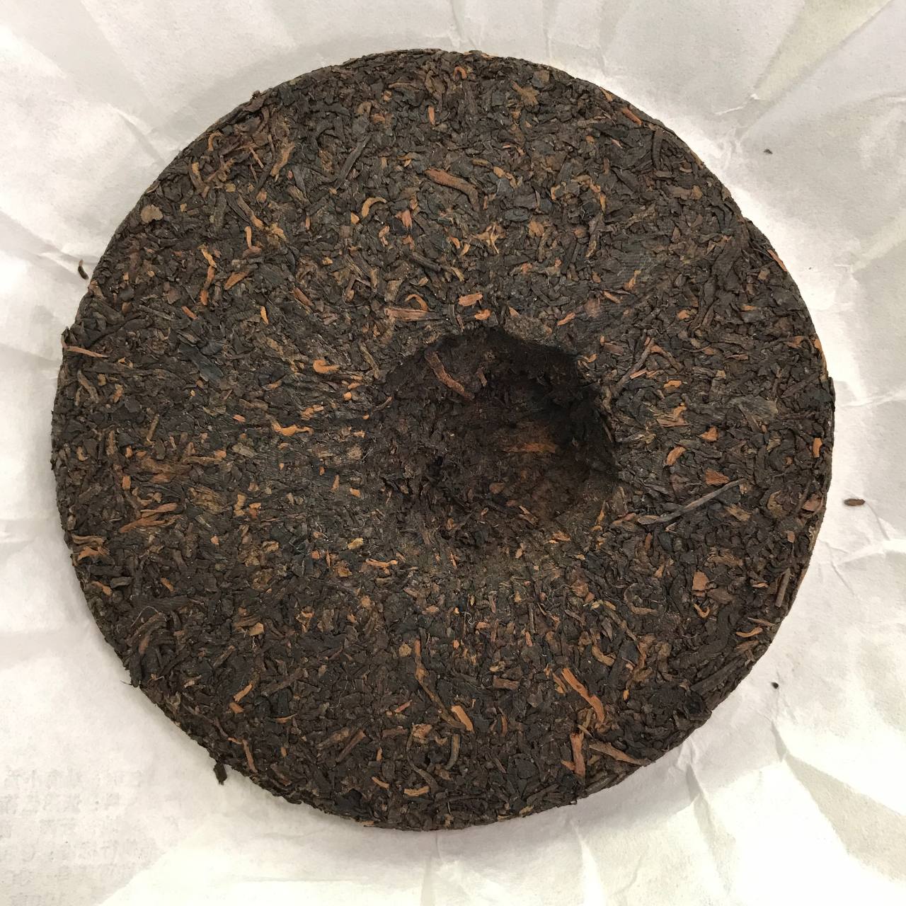 МАЛИЙ ІМПЕРАТОРСЬКИЙ МЛИНЕЦЬ ІЗ МЕНХАЮ (勐海小贡饼 熟茶)