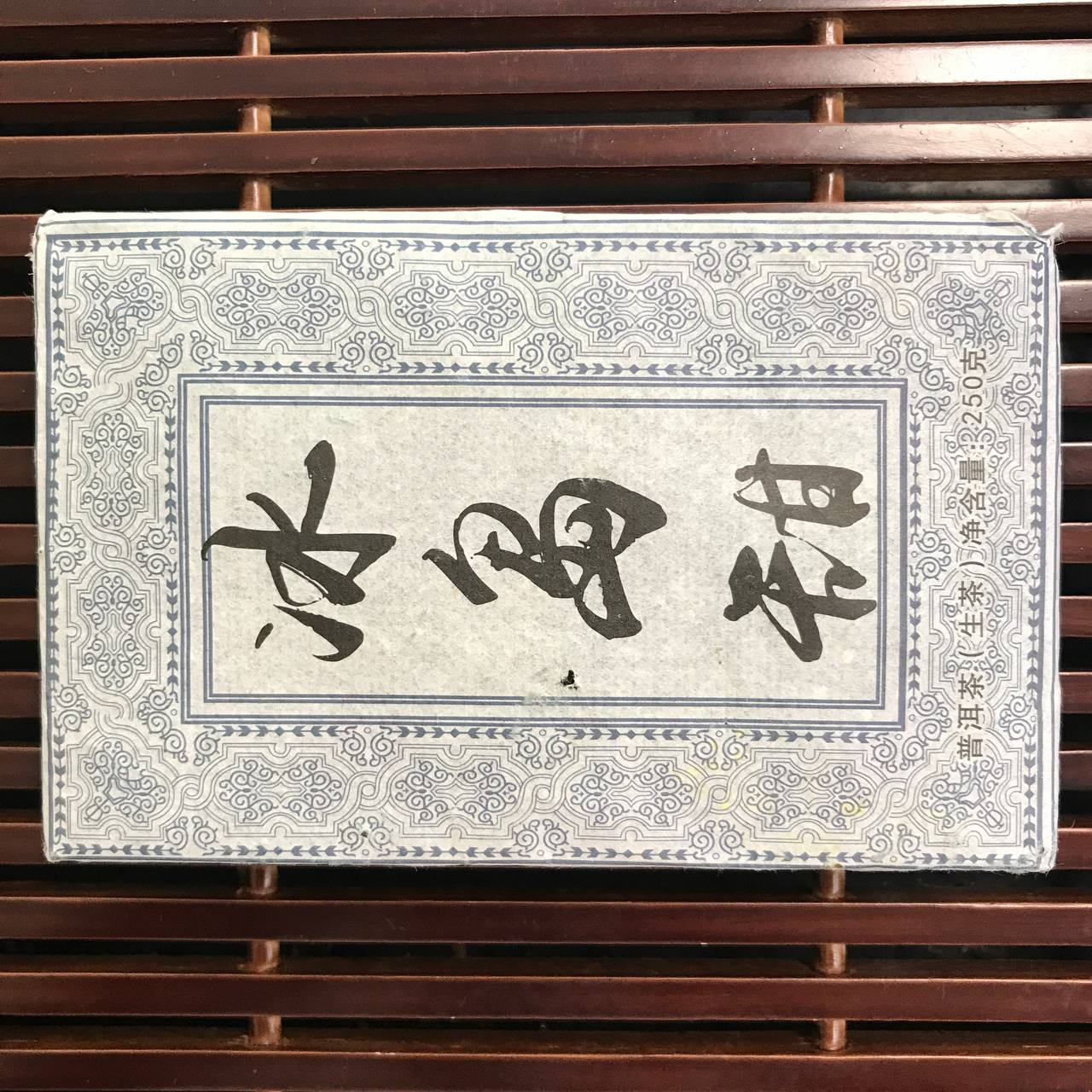 ШЕН ПУЕР "МЕНГУ СИНЬ БІНЬ" (蒙古新餅)