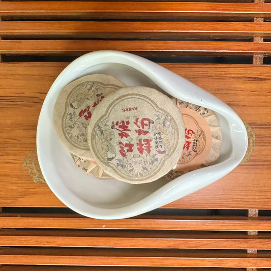 ГУЙ ХУА ШУ ПУЕР (桂花熟普洱 / Guì Huā Shú Pǔ'ěr)